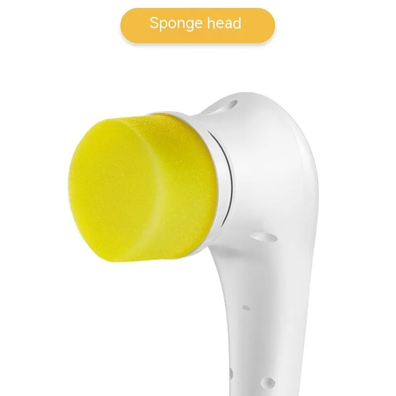 White cordless electric handheld scrubber with five attached brush heads on a kitchen counter