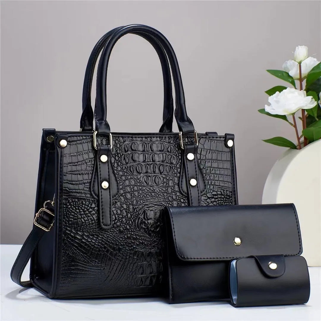 Contrast colour three-piece bag set showing bucket-shaped crossbody bag, wallet, and card holder in coordinated colours