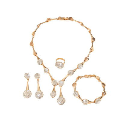 Gold tone alloy jewellery set with flower pendant necklace, bracelet and earrings in plant and flower pattern