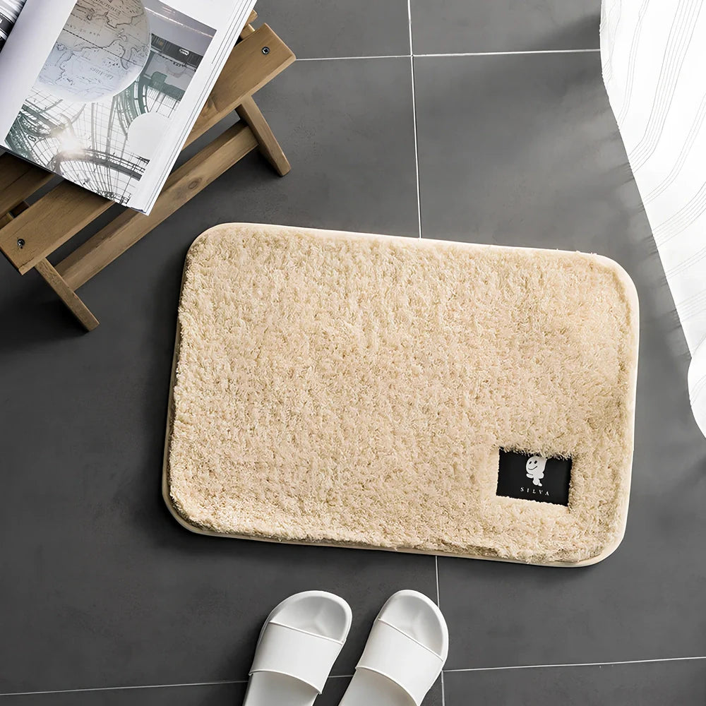 Rectangular anti-slip bathroom mat with polyester fibre construction in multiple colour options