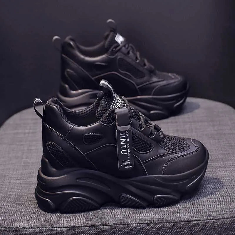 Women's black mesh platform casual shoes with a hollow-out design and a toe-holder strap.