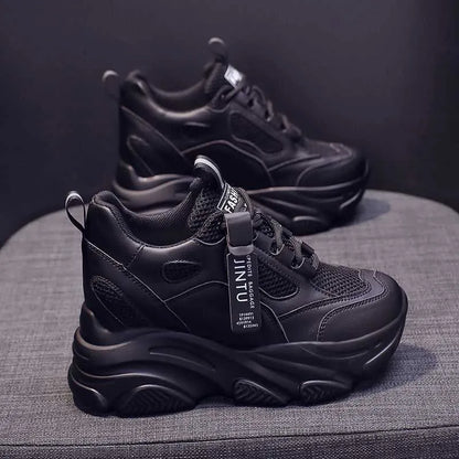 Women's black mesh platform casual shoes with a hollow-out design and a toe-holder strap.