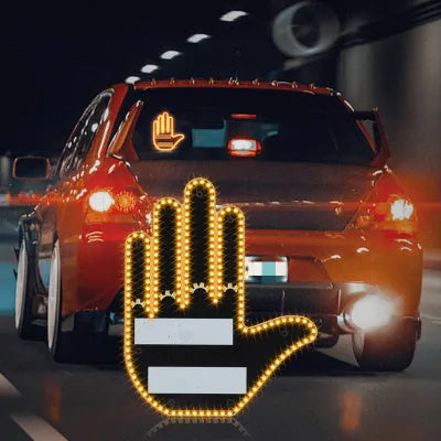 Black plastic LED gesture car light showing illuminated hand symbol, with remote control.