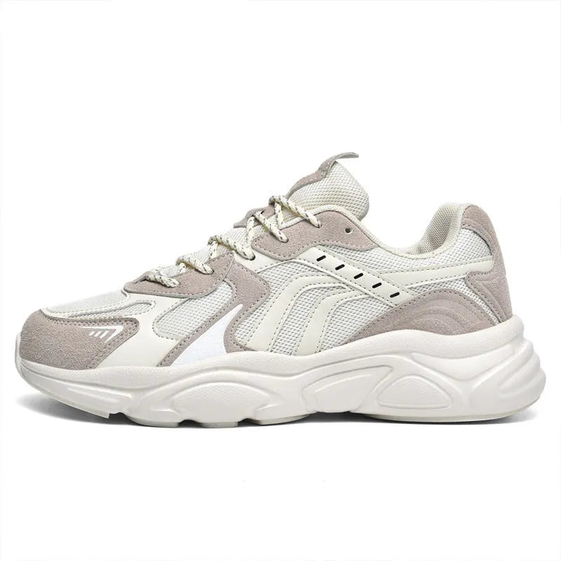 Men's beige and black collapse flat casual sneakers with low heel on a plain background