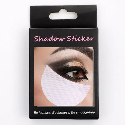 Half-moon shaped under-eye makeup shields on skin during eyeshadow application