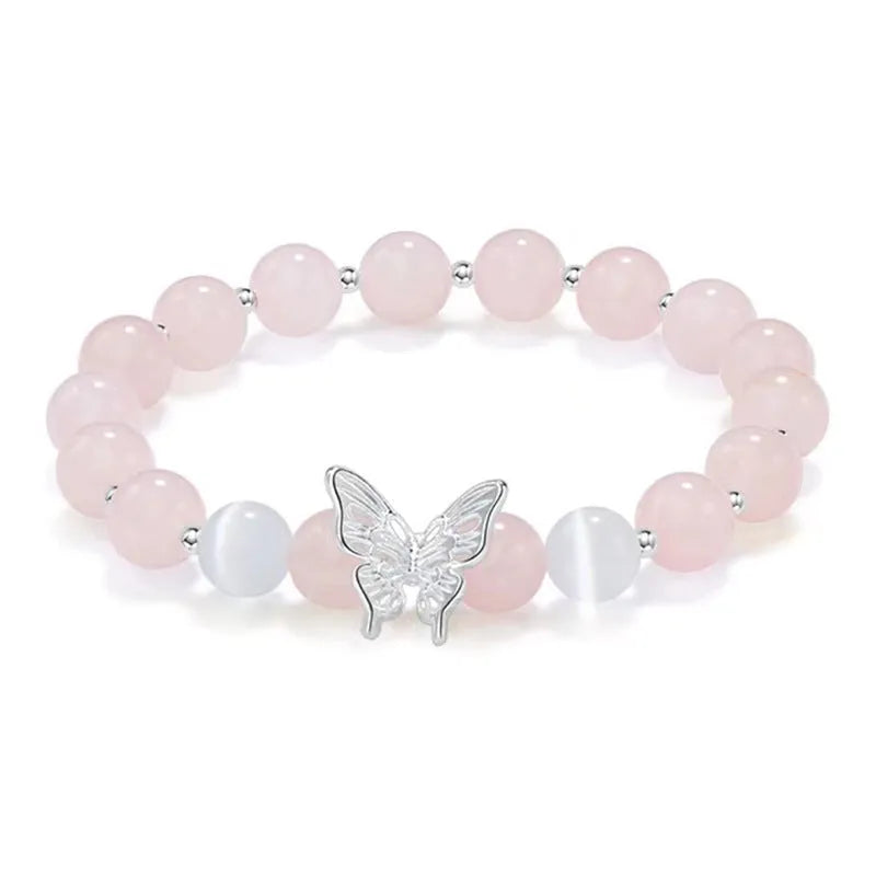 Women's crystal bow bracelet with butterfly design in ocean blue, pink, and purple colour options