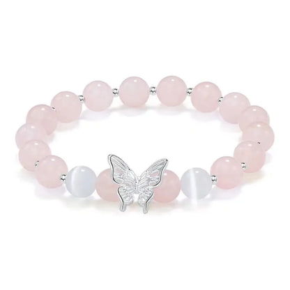 Women's crystal bow bracelet with butterfly design in ocean blue, pink, and purple colour options