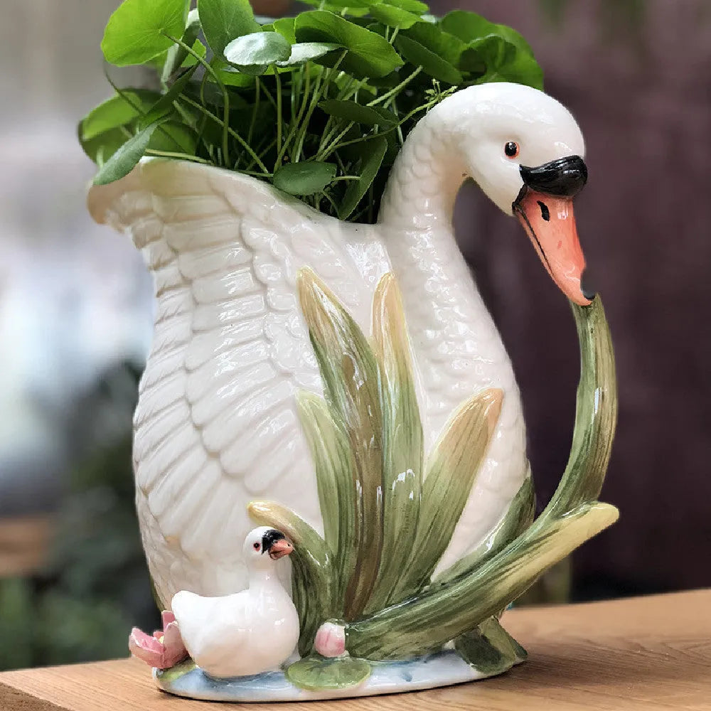 Ceramic swan vase with embossed pastoral style, 24.1cm by 15.2cm by 20cm, single vase in picture colour.