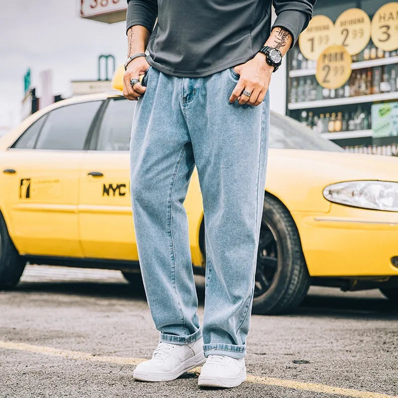 Men's loose straight jeans in dark blue colour showing relaxed fit and traditional styling