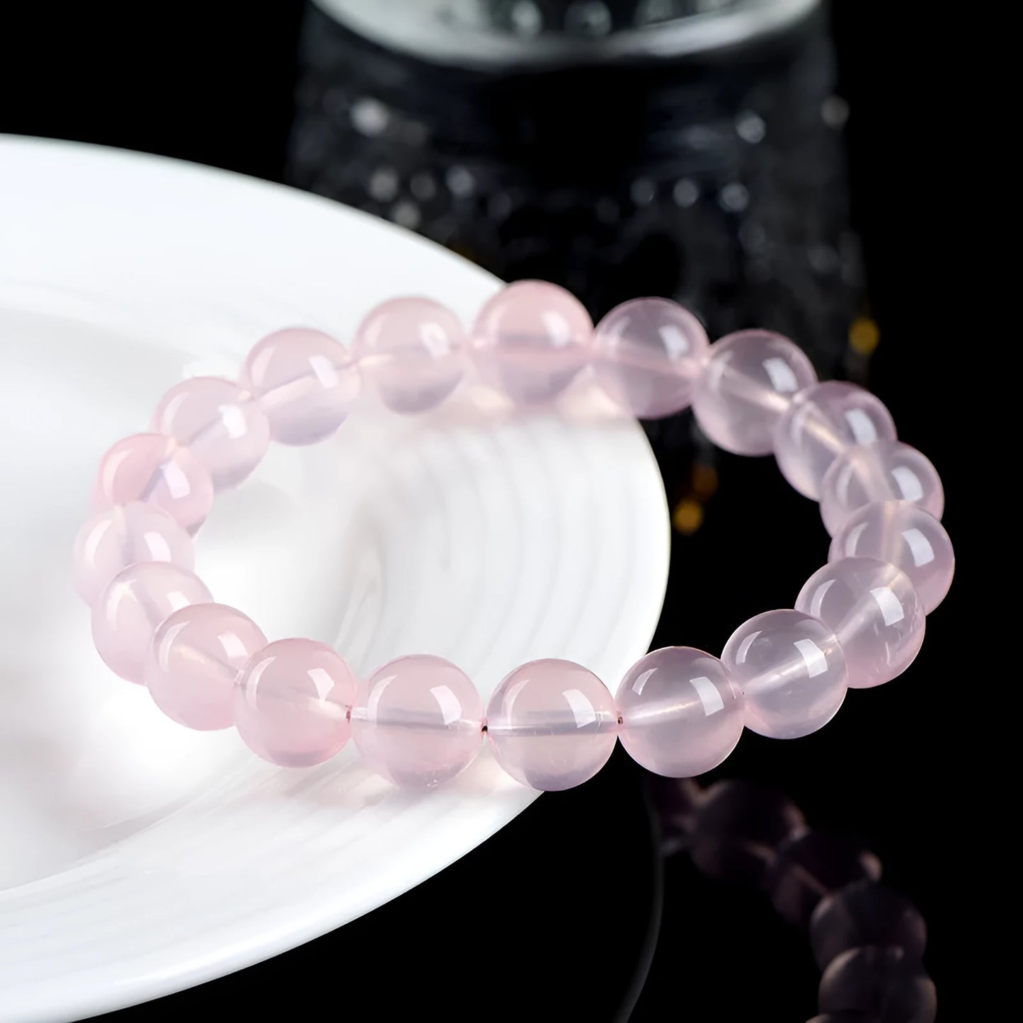 Natural starlight crystal bracelet with polished pink beads in multiple size options