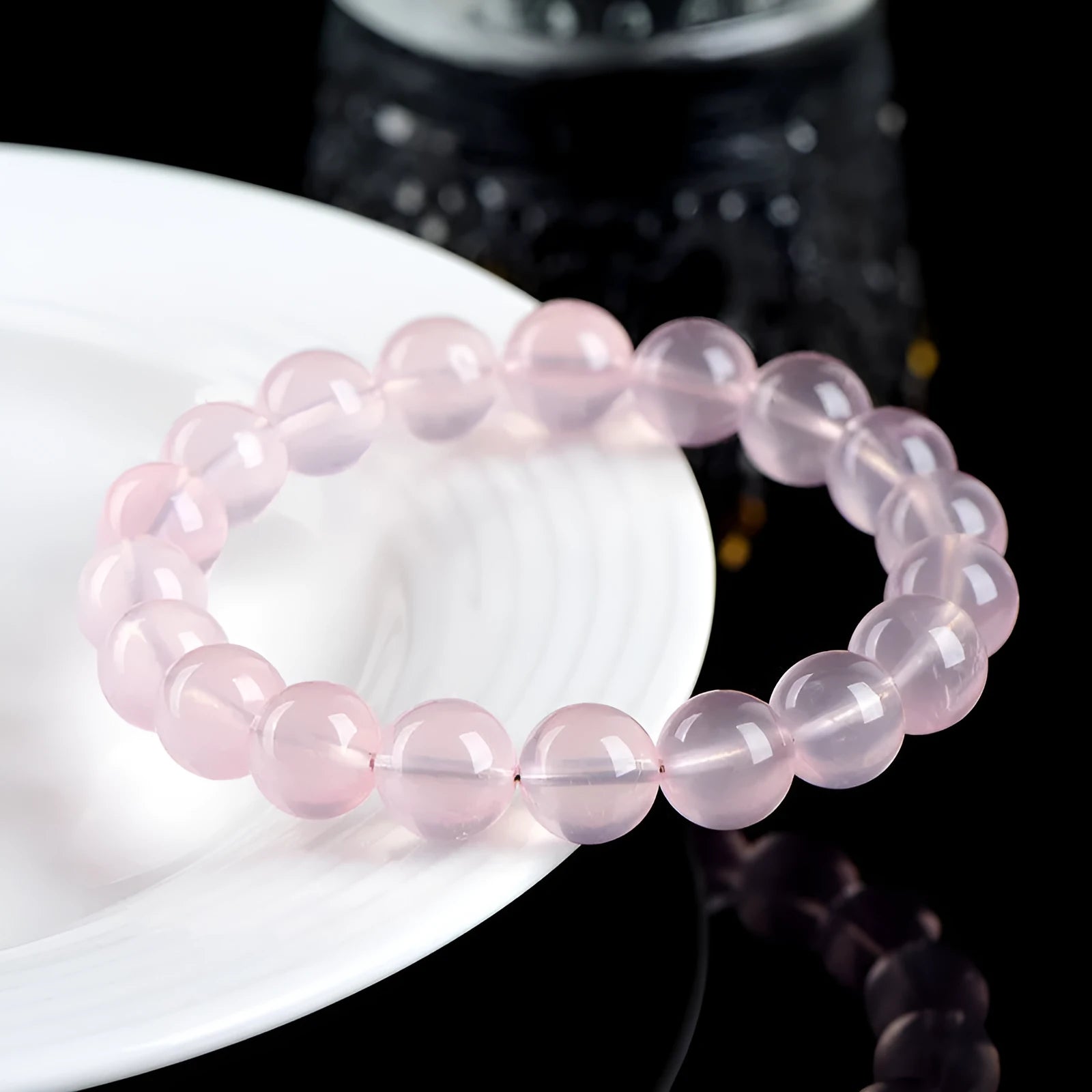 Natural starlight crystal bracelet with polished pink beads in multiple size options