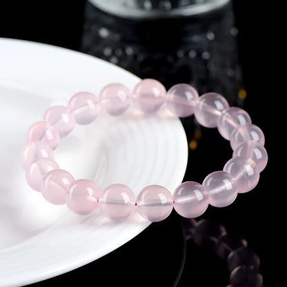 Natural starlight crystal bracelet with polished pink beads in multiple size options