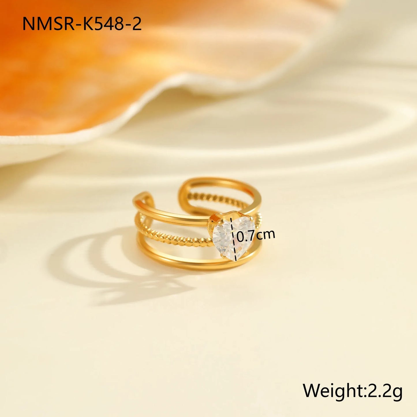 Gold electroplated stainless steel ring with heart shape design and open mouth fitting