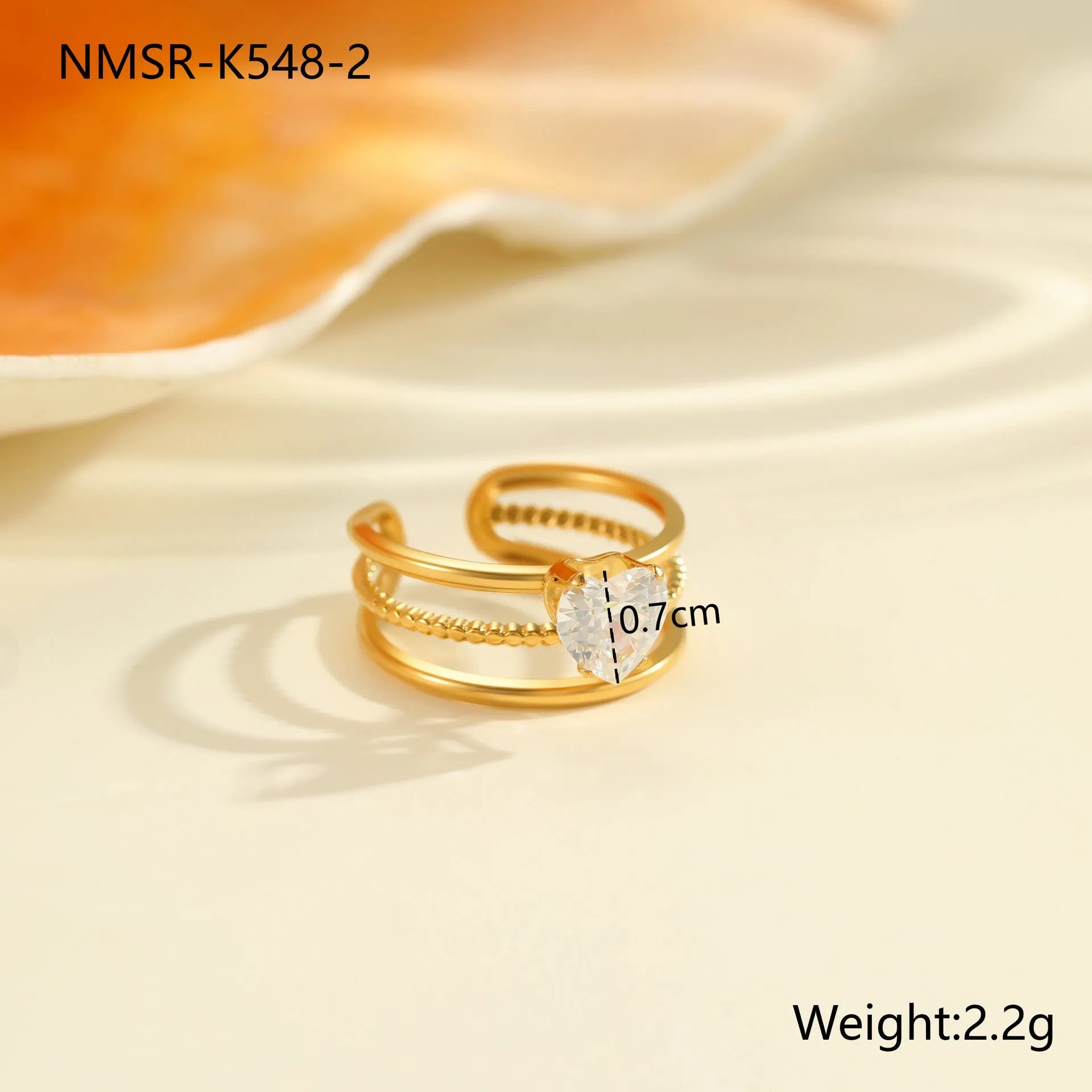 Gold electroplated stainless steel ring with heart shape design and open mouth fitting