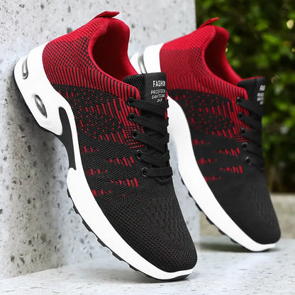 Men's black Flyknit mesh sneakers with round toe and lace-up front in casual low-top design
