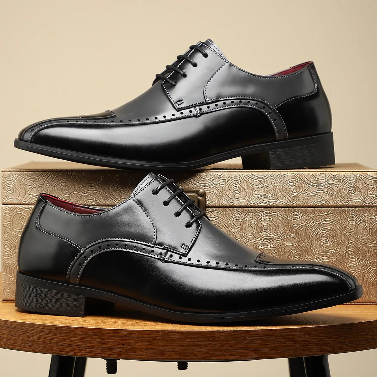 Men's black leather business casual shoes with stitching detail and a low-top design.