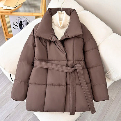 Stylish plaid belted winter coat for women in black, white, and brown