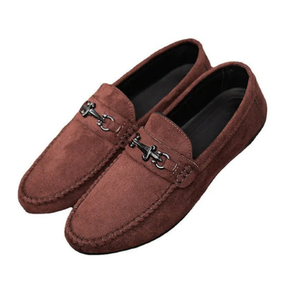 Men's black waterproof slip-on loafers with round toe and low heel on a rubber sole.