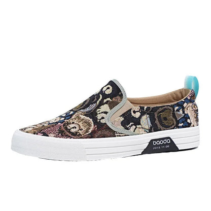 Low-top canvas slip-on sneakers with a vulcanised rubber sole in khaki colour on a neutral background.