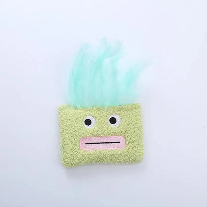 Colourful plush cat toy shaped like an explosion head with a large open mouth, shown in blue.