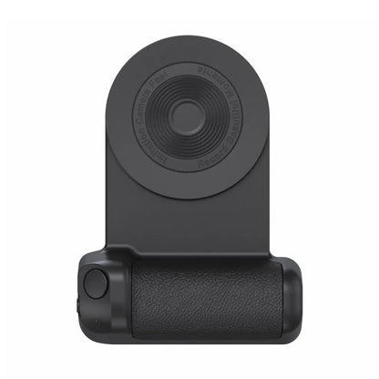 Black magnetic phone camera grip with rotatable bracket and ergonomic PU leather handle on a table.