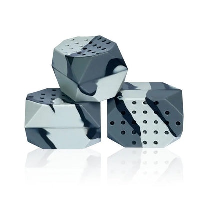 Two camouflage silicone facial muscle fitness balls for jaw training.
