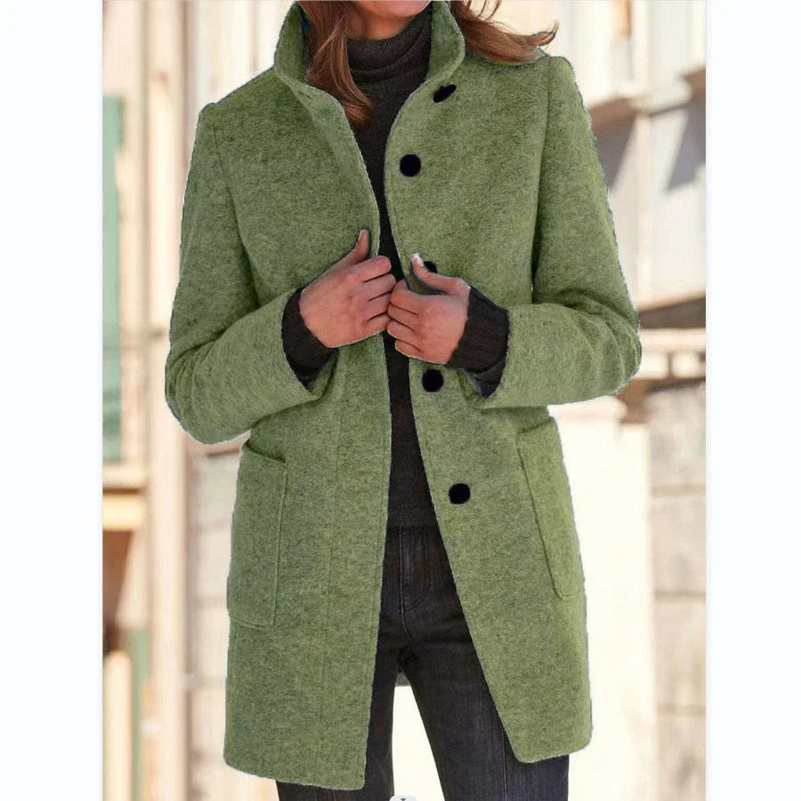 Stylish wool coat with stand collar, pockets, and slim fit design for casual winter wear.