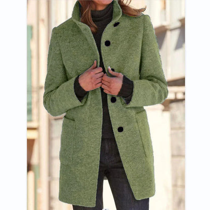Stylish wool coat with stand collar, pockets, and slim fit design for casual winter wear.