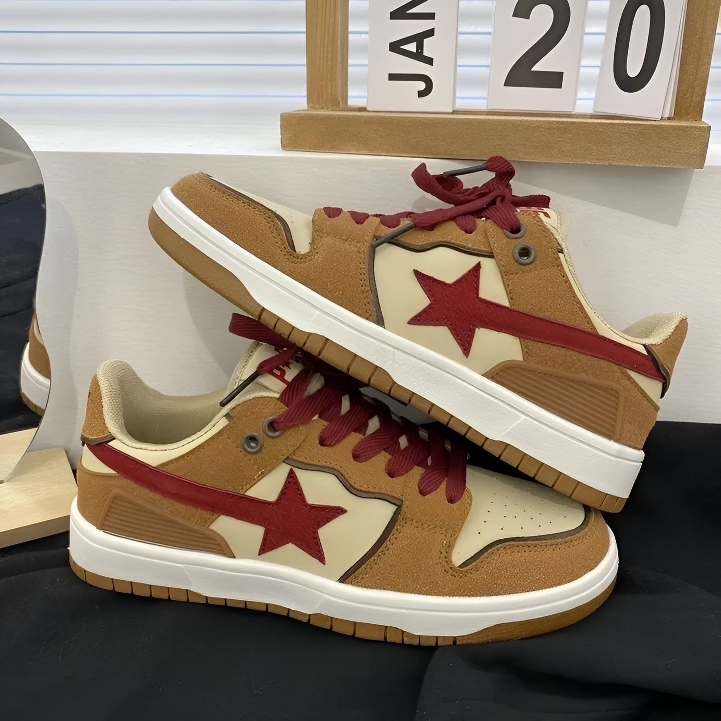 Brown women's low-top platform sneakers with lace-up front and round toe