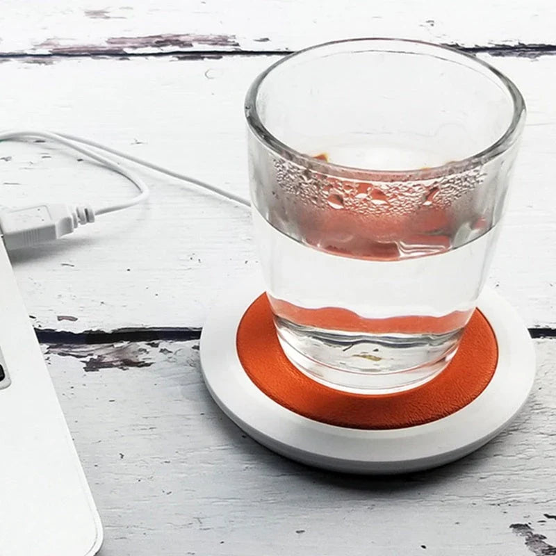 USB-powered heated coaster in various colours to keep coffee, tea, and other hot beverages warm