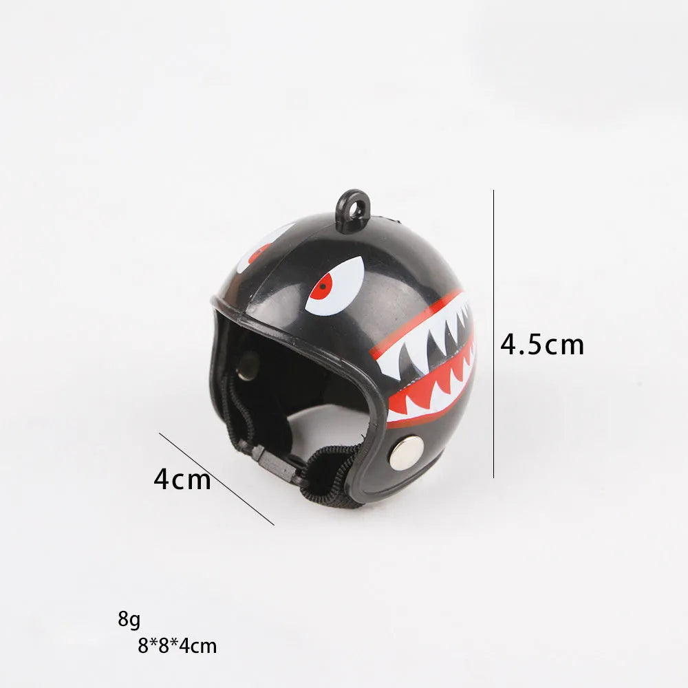 Small hard plastic helmet with elastic straps and sponge lining, designed for a chicken or bird to wear.