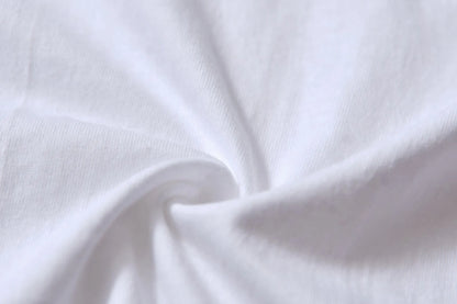 White cotton T-shirt style overalls with short sleeves and loose fit pullover design