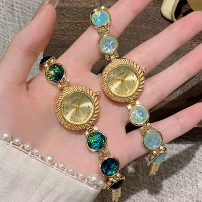 Women's quartz watch with 25mm round dial in a choice of six colours including Milky White, Dark Green, and Cherry Pink.