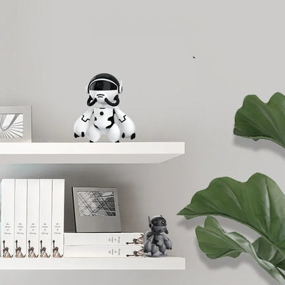 Space Robot smart home monitor in white and black colours on its detachable base.