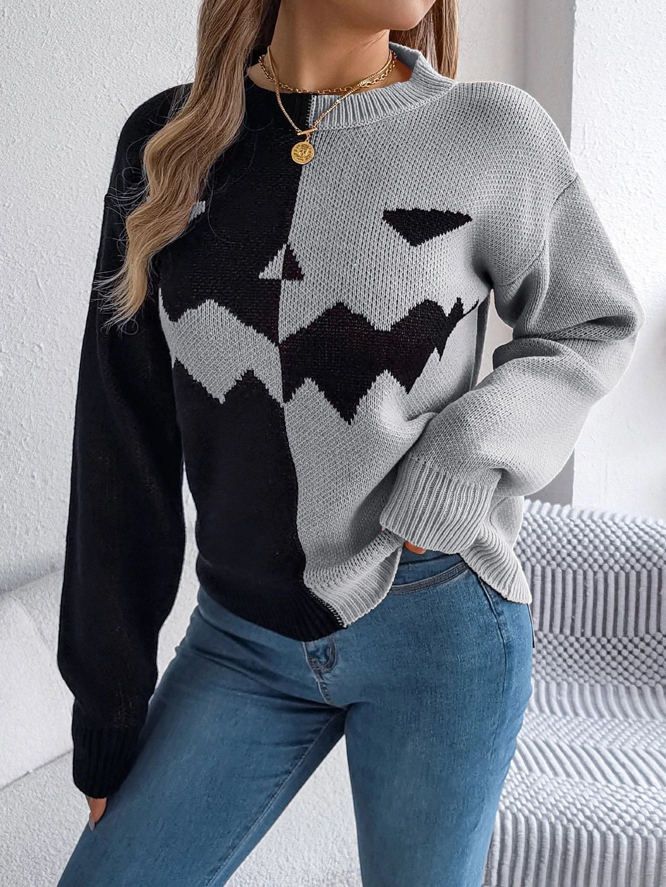 Spooky and stylish Halloween pullover sweater with ghost pattern design in various colors