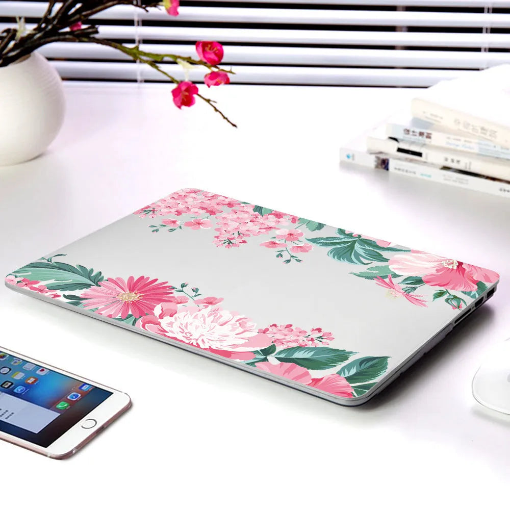 Plastic laptop protective shell with floral pattern for MacBook Air 11 inch and MacBook Pro 12 inch retina.