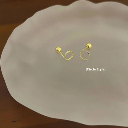 Pair of small spiral geometric ear studs with gold hollow thread finish in mixed material, shown in eight shape options.