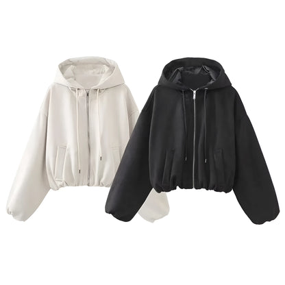Women's casual hooded suede jacket in black colour on a hanger.