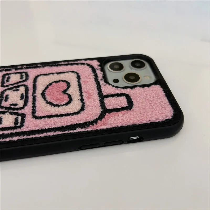 Pink iPhone back cover case with embroidered towel texture design for iPhone models X through 15 Pro Max.