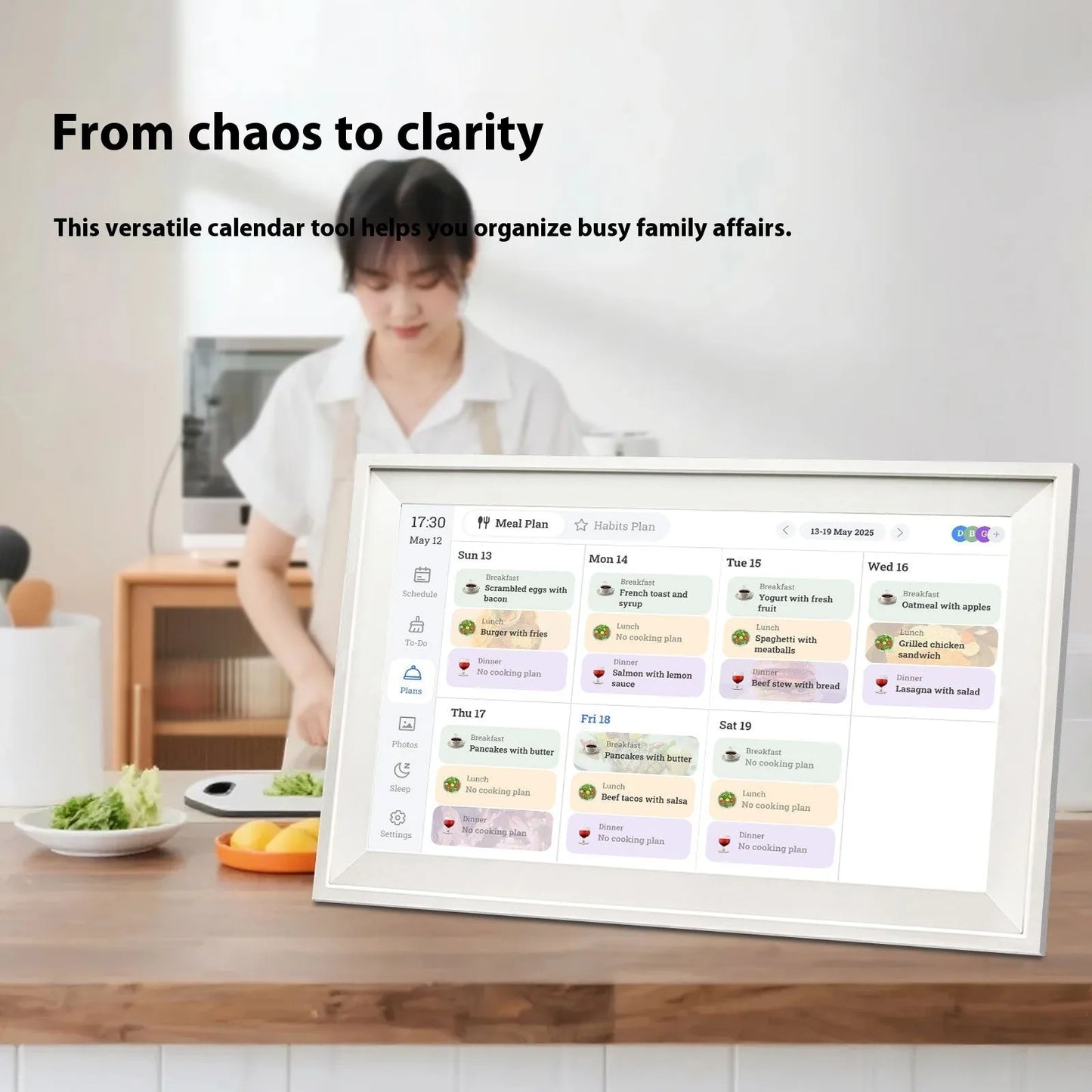 White Smart Digital Photo Frame with 15.6 inch screen displaying a family photo, shown on a wooden shelf.