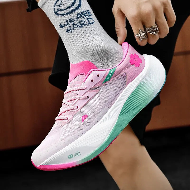 Low-top running shoes with carbon plate on a road, showing PU mesh upper and natural rubber sole in Glacier colour.