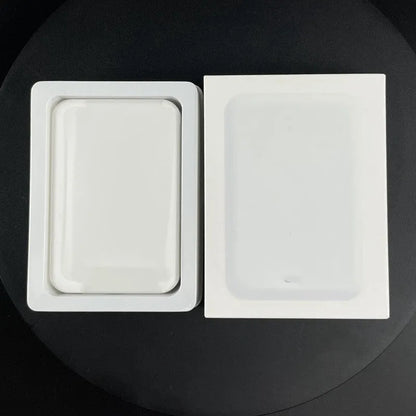 White magnetic wireless charging power bank showing compact size and creative design.