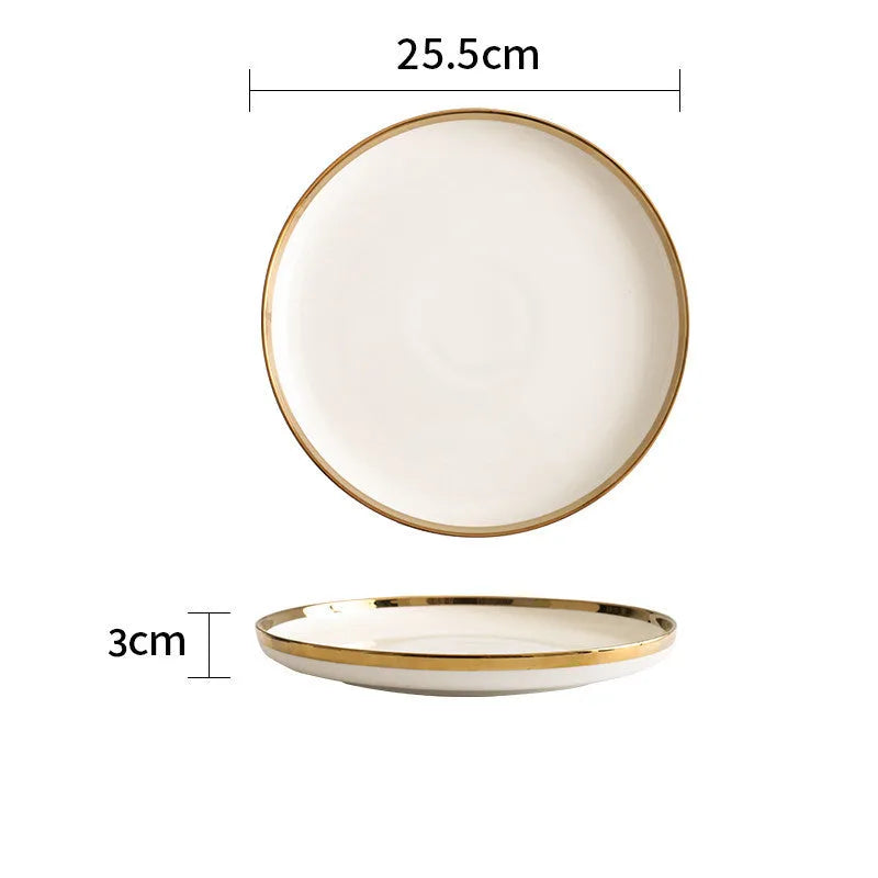 Platinum-coloured porcelain bowl and plate with gold rim, part of a wedding gift tableware set.