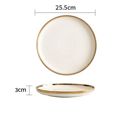 Platinum-coloured porcelain bowl and plate with gold rim, part of a wedding gift tableware set.