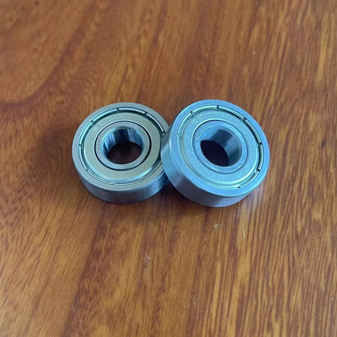 6000ZZ carbon steel ball bearing with 10x26x8mm dimensions and metal shields.