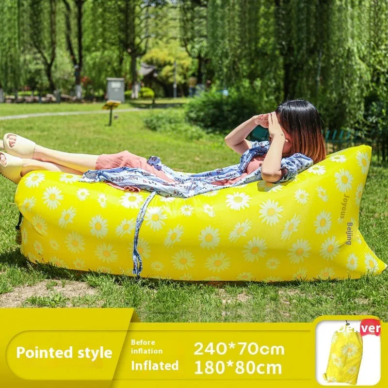 Yellow smiling face pattern inflatable portable seat for outdoor use