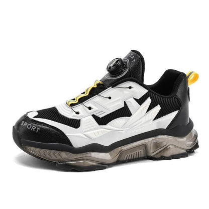 Men's black casual shoes with a rotating button fastener and mesh upper on a low platform sole