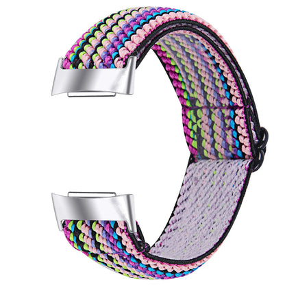 Printed elastic watch strap compatible with Fitbit Charge 6 shown in adjustable position