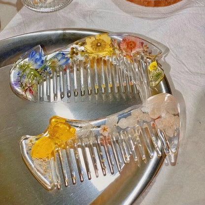 Mirrored glossy resin hair comb in three colour options, measuring under 10cm