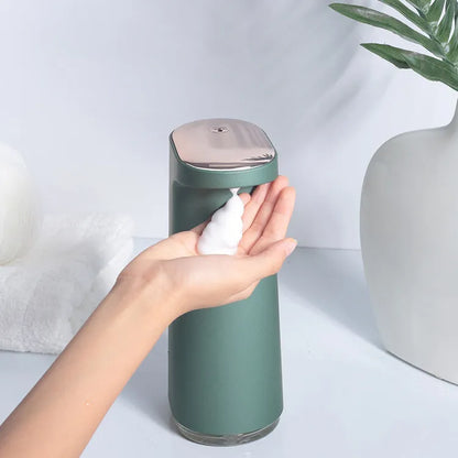 White automatic foam soap dispenser with infrared sensor for touch-free hand washing.